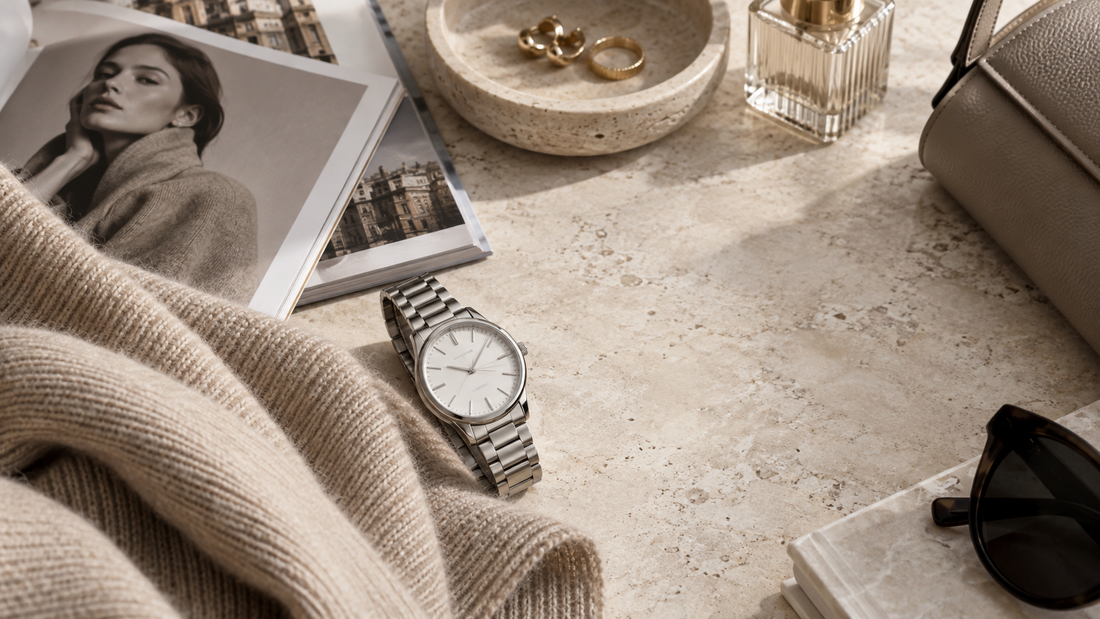 Fall 2026 quiet luxury fashion with a minimalist stainless steel watch