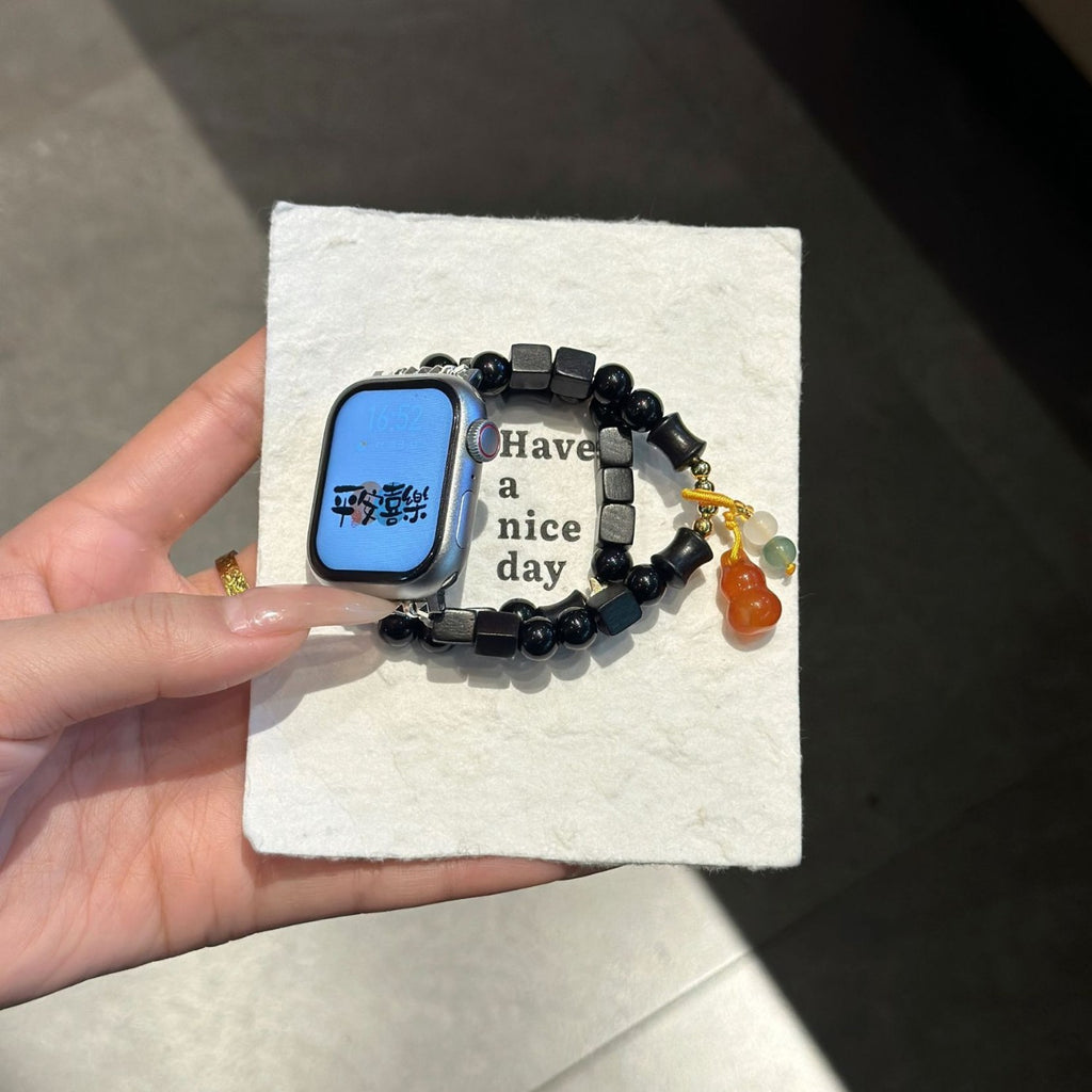 Black beaded amber charm Apple Watch bracelet band card view
