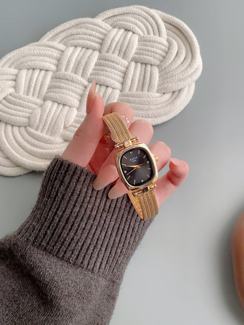 Annie Time cushion mesh watch in gold tone with black dial