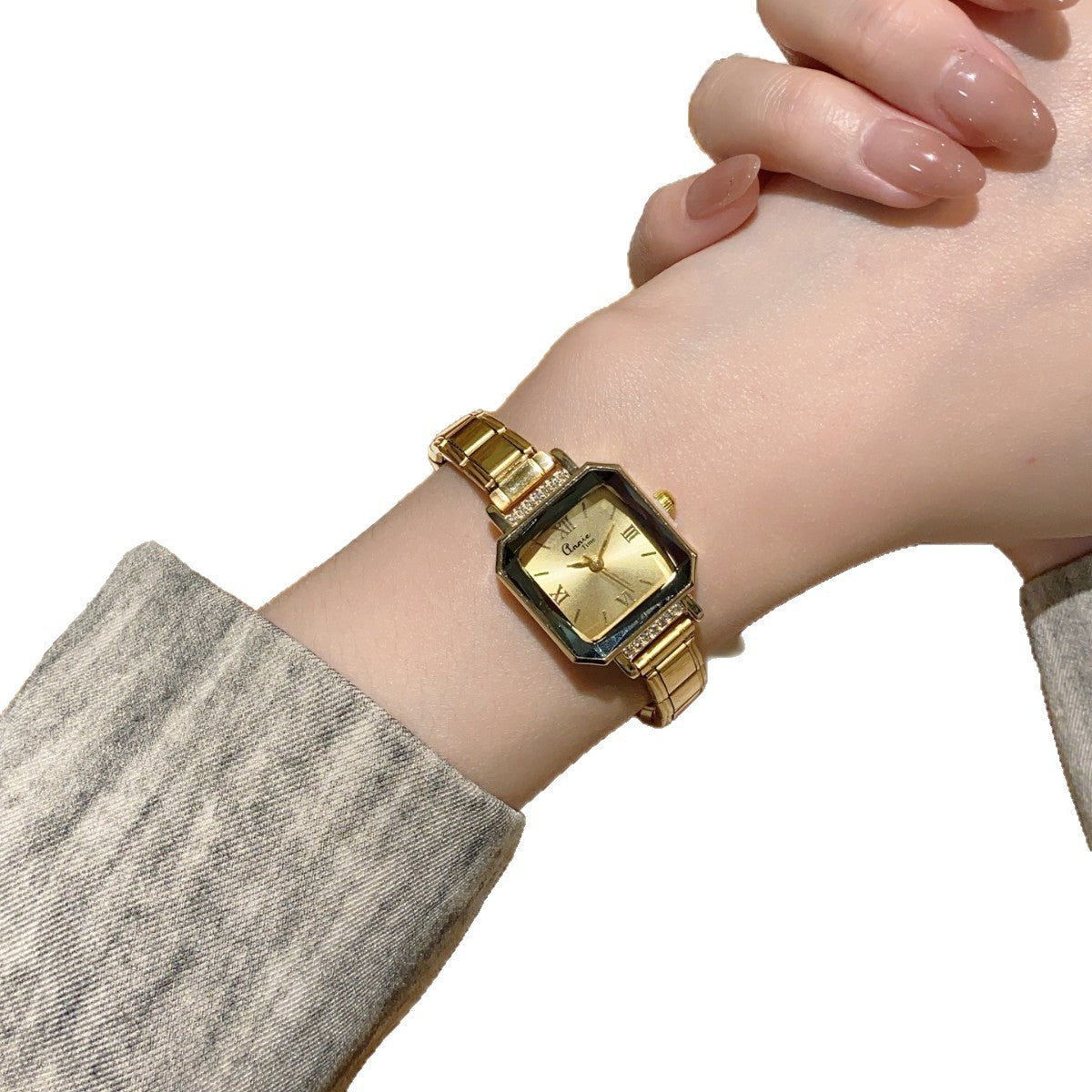 Annie Time cushion champagne dial stretch bracelet watch worn on wrist