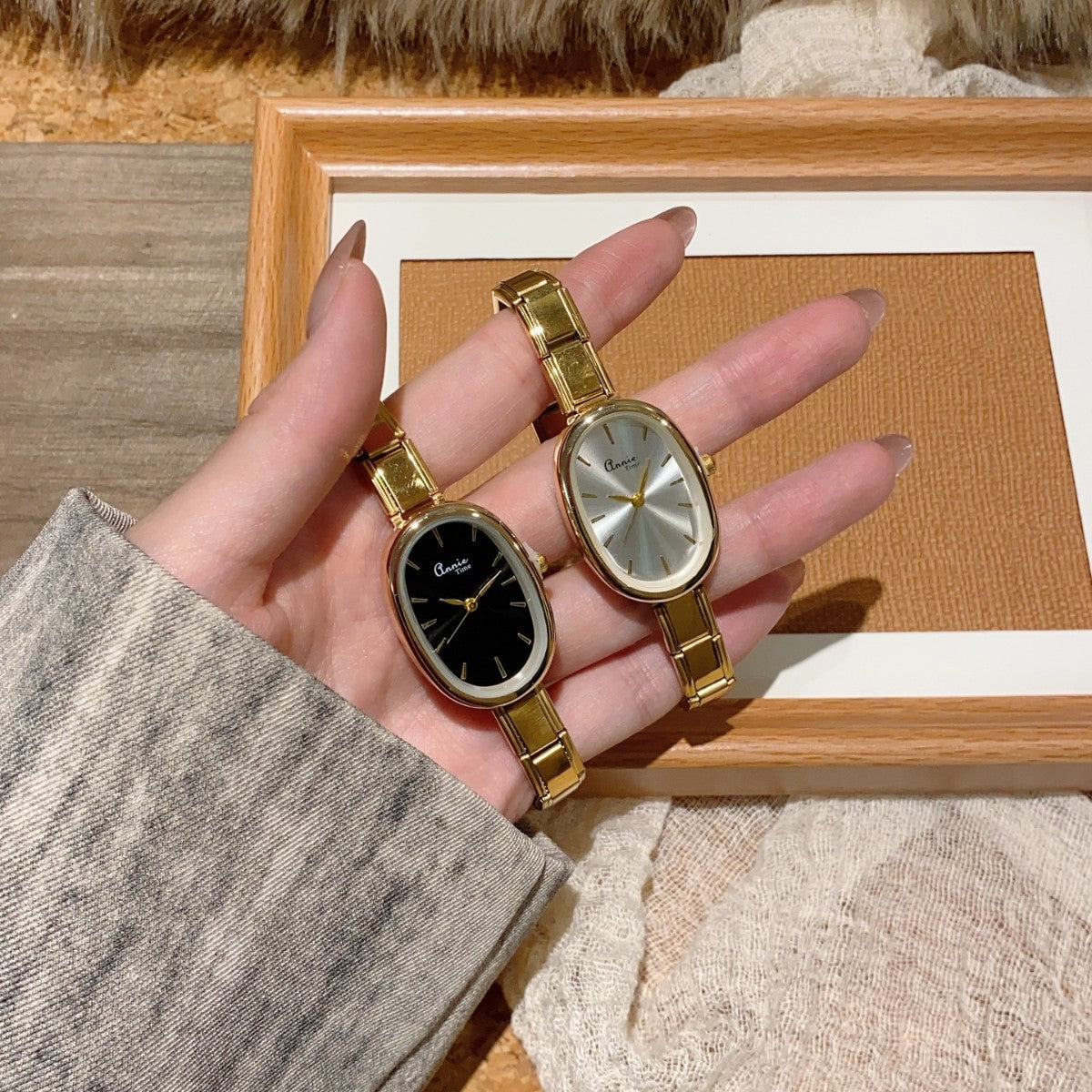 Annie Time oval stretch bracelet watches with black and silver dials