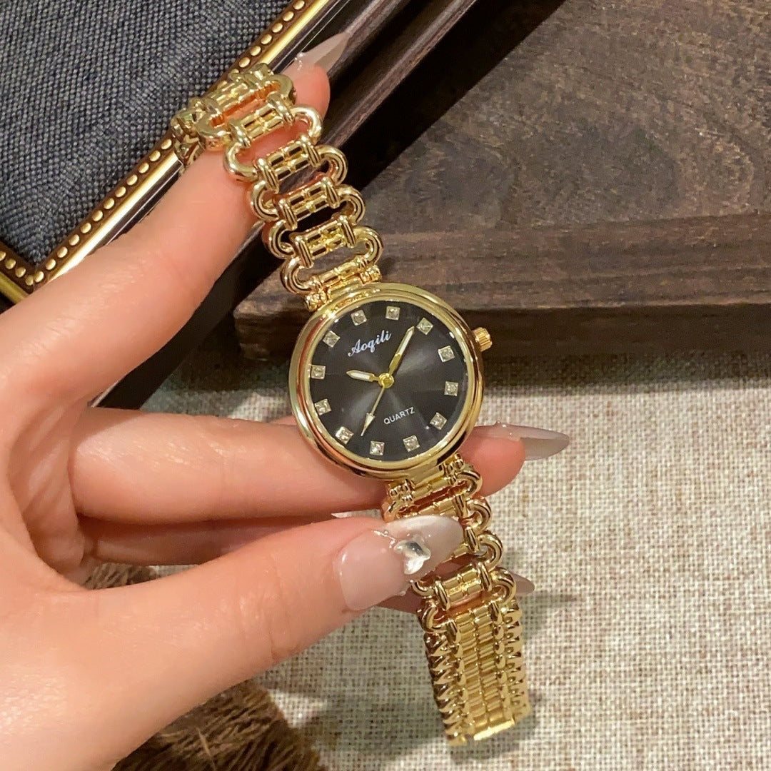 Aoqili round link bracelet watch in gold tone with black dial
