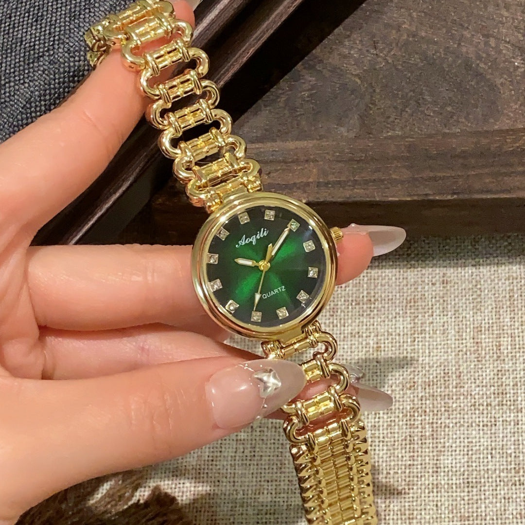 Aoqili round link bracelet watch in gold tone with green dial