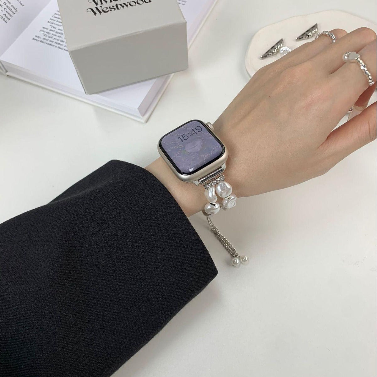 Baroque pearl double-chain smartwatch band worn on wrist
