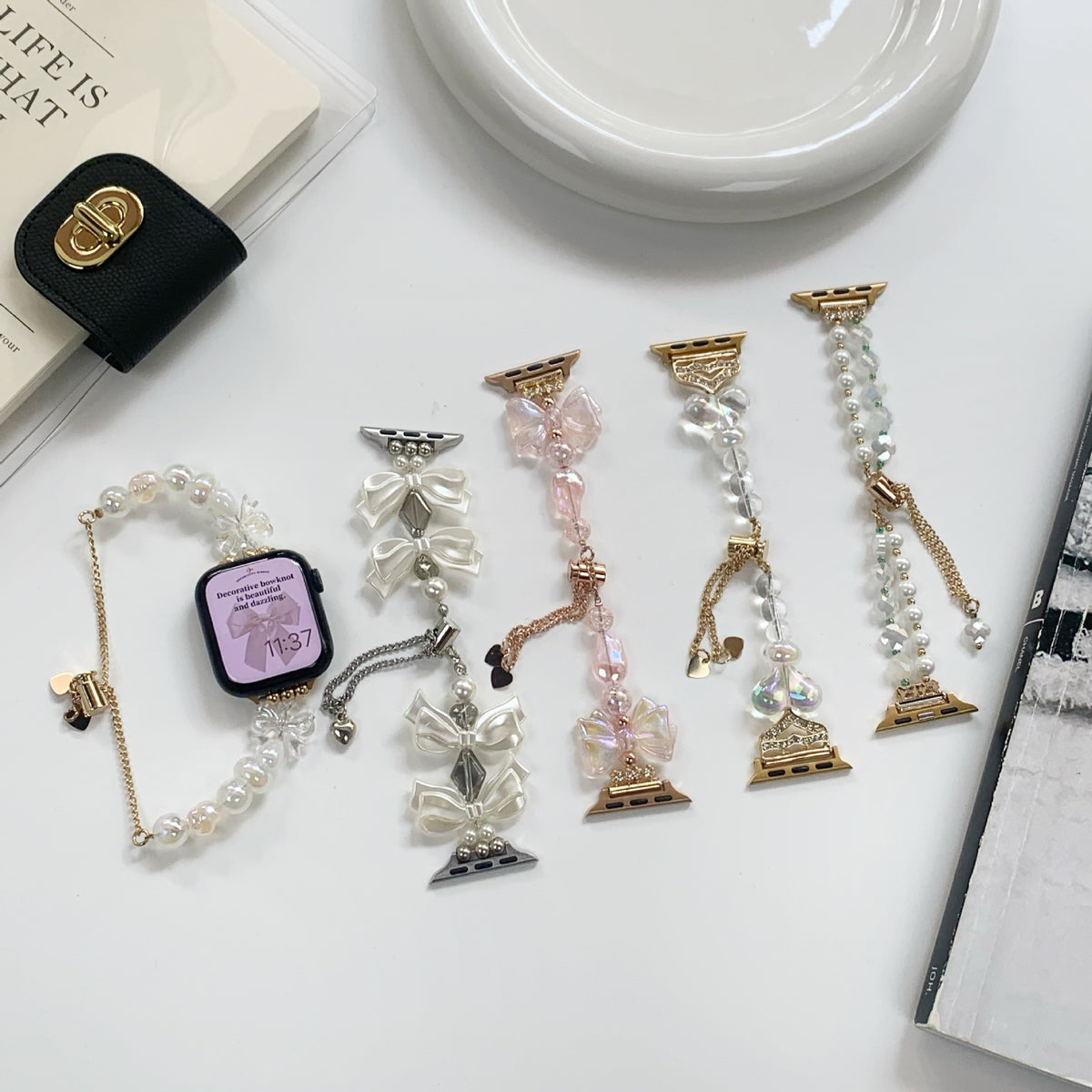Five bow crystal and pearl Apple Watch band styles