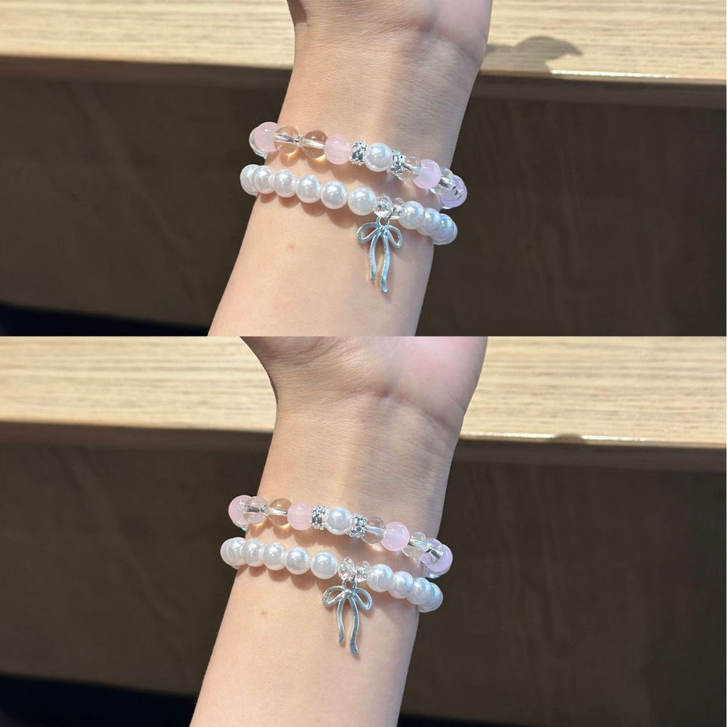 Double-strand pearl and blush bead bracelet band with bow charm