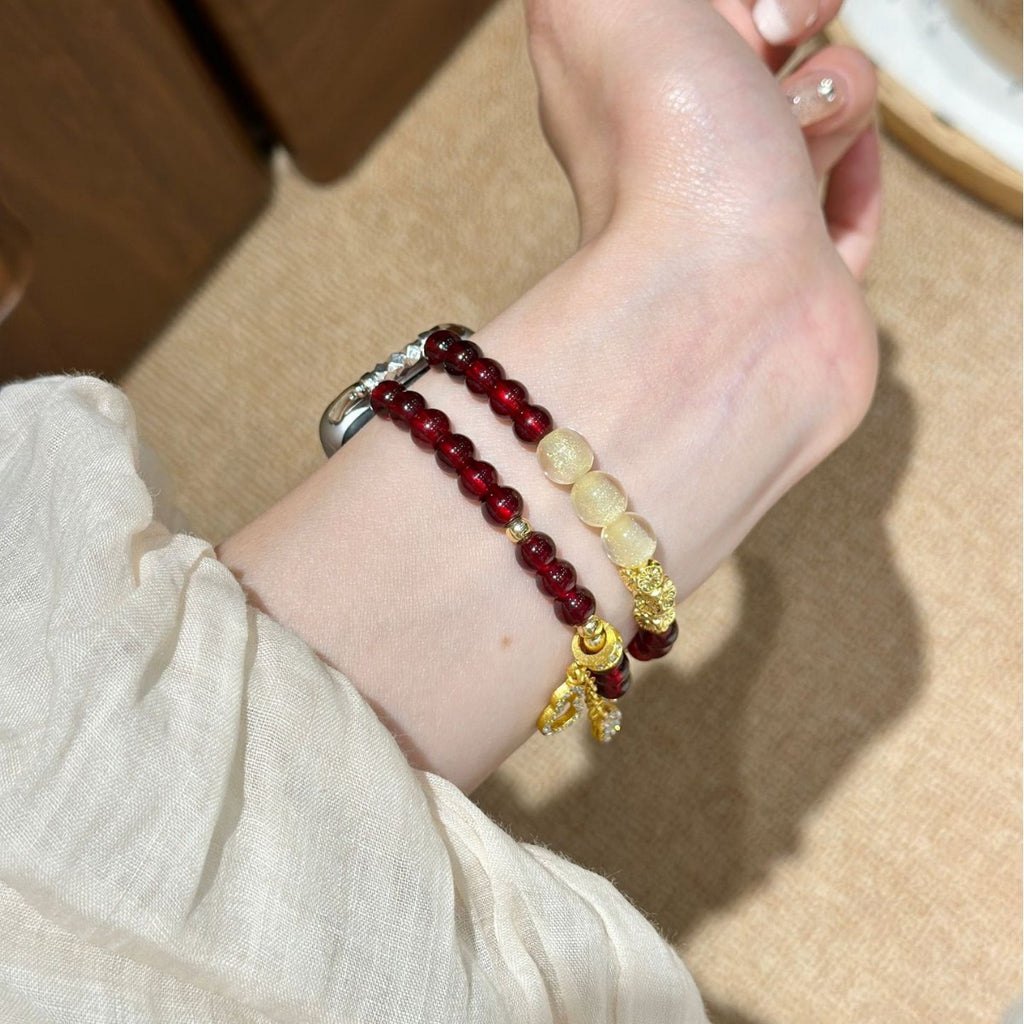 Burgundy and ivory Apple Watch bracelet band side view