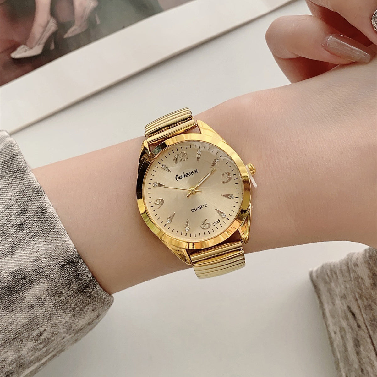 CABOSEN vintage gold-tone stretch bracelet quartz watch with Arabic numeral dial
