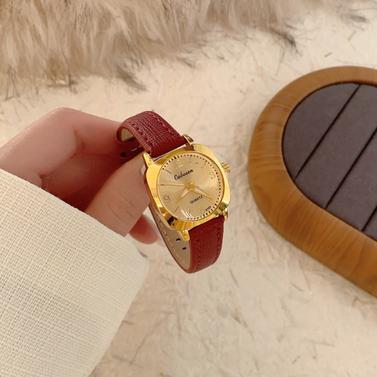 CABOSEN vintage small women's watch with burgundy leather-style strap and champagne dial close-up