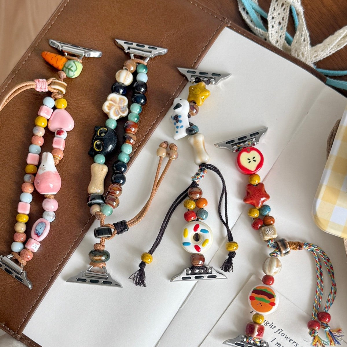 Four colourful candy cord charm Apple Watch band styles