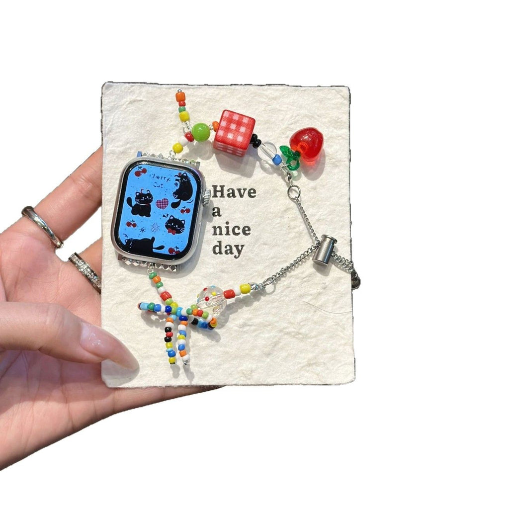 Multicolor beaded Apple Watch band with red apple charm