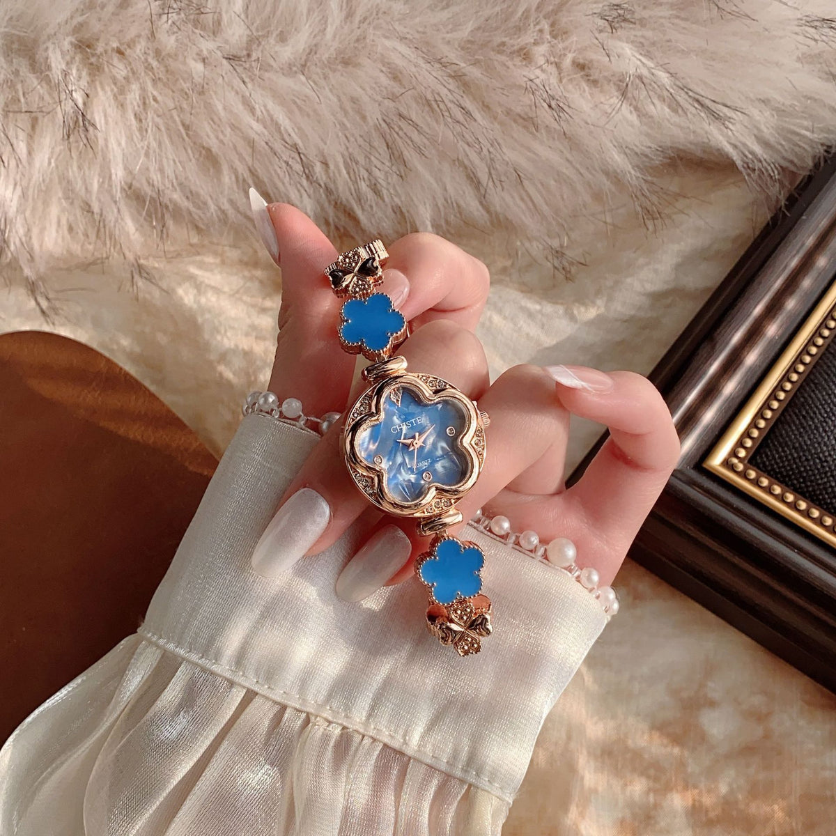 CHISTE flower bracelet watch with blue accents alternate view