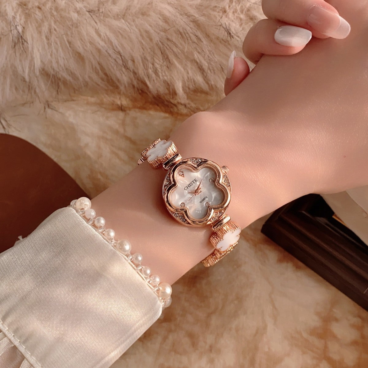CHISTE flower bracelet watch with white floral dial and accents