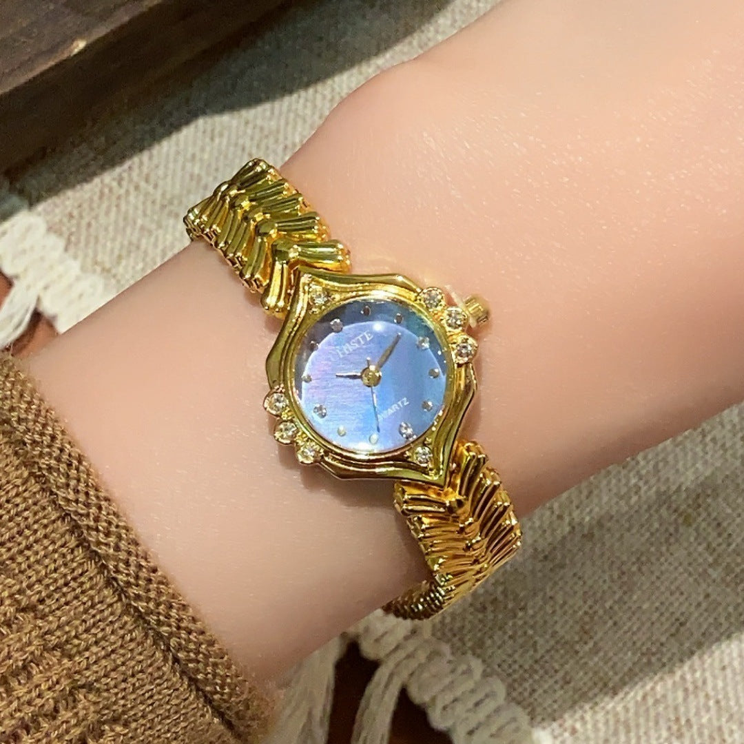 CHISTE vintage bracelet watch in gold tone with blue dial alternate view