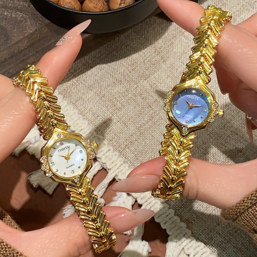 CHISTE vintage bracelet watch in gold tone with blue dial
