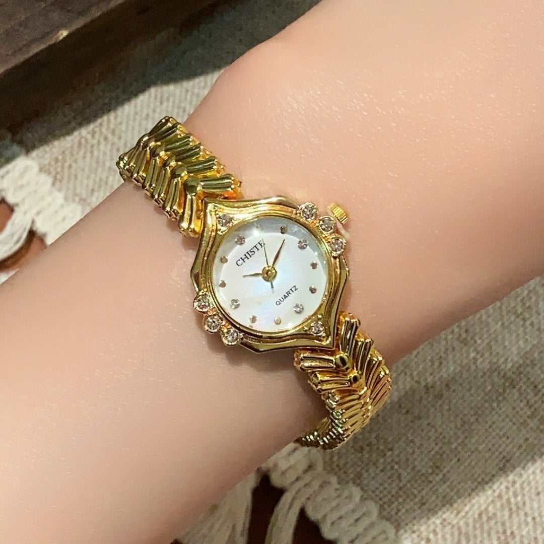 CHISTE vintage bracelet watch in gold tone with white dial