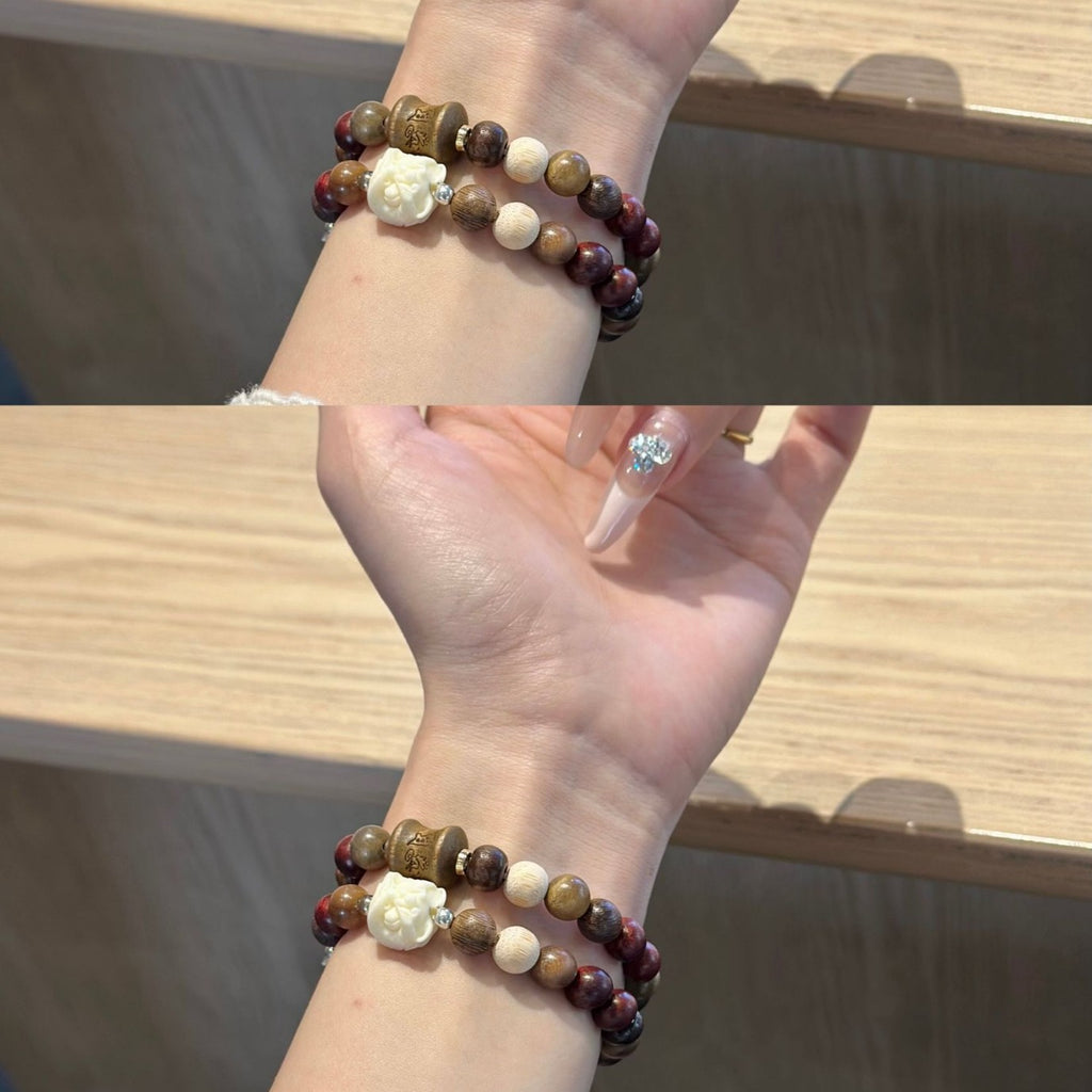 Brown rose double-strand Apple Watch bracelet band worn on wrist