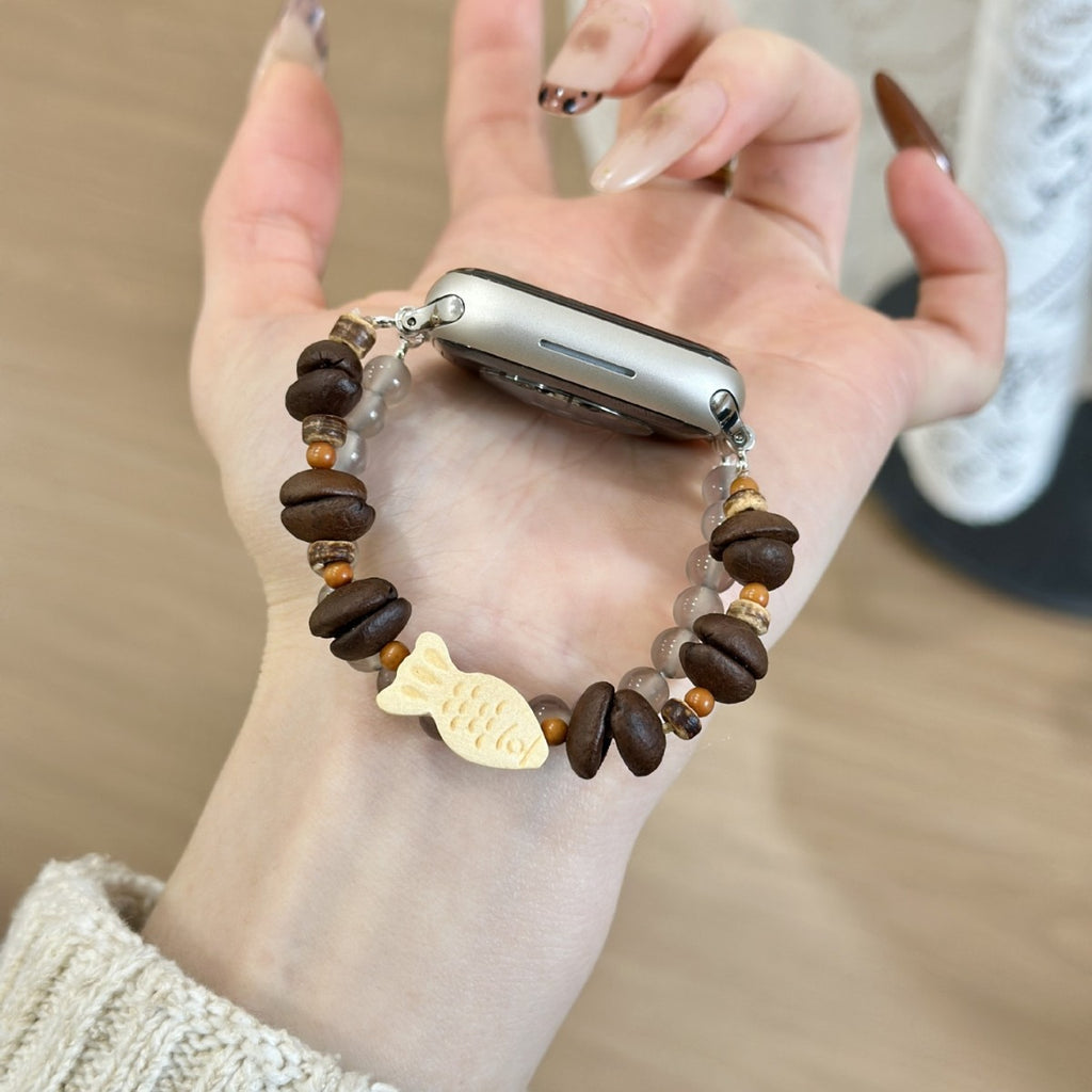 Brown wood and smoky bead fish charm Apple Watch bracelet band side view