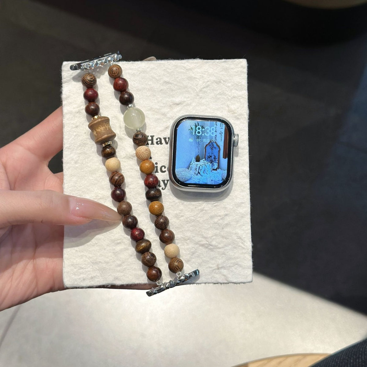 Earth-tone double-strand Apple Watch bracelet band display