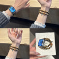 Green sandalwood-style double-strand beaded Apple Watch band worn on wrist