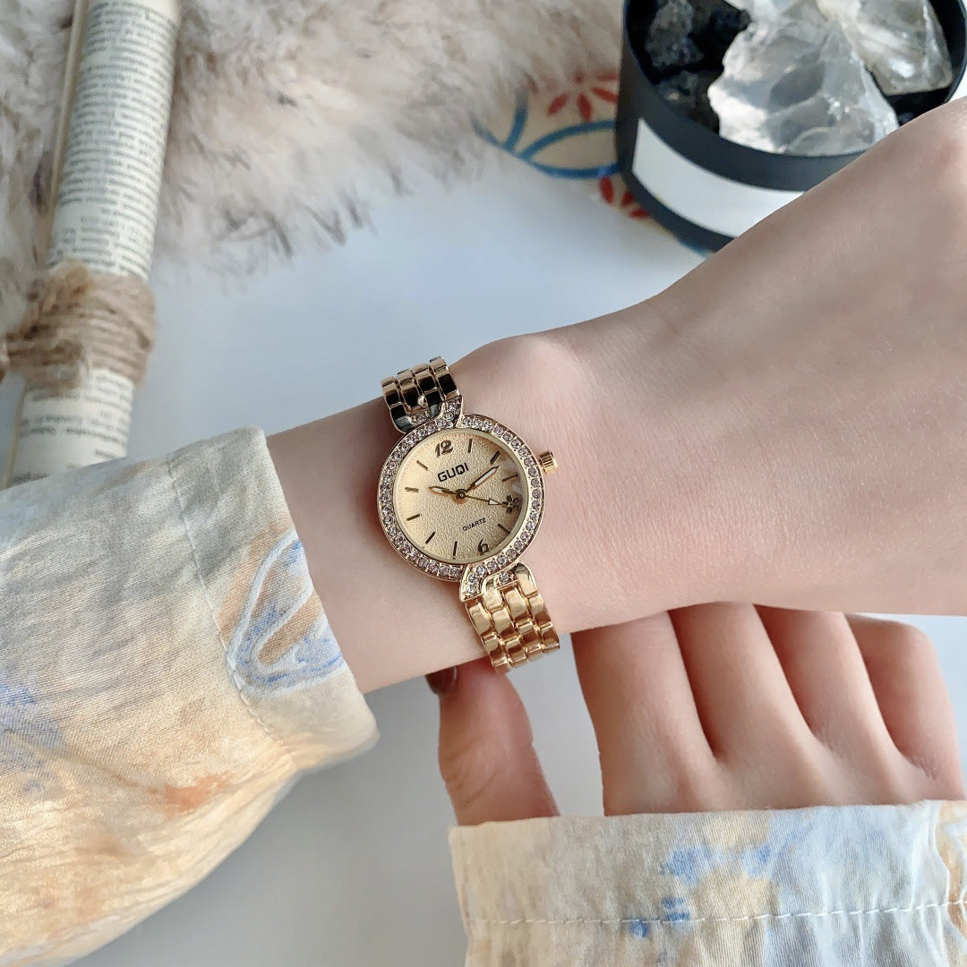 GUDI crystal-style bezel round bracelet watch in gold tone with champagne dial alternate view