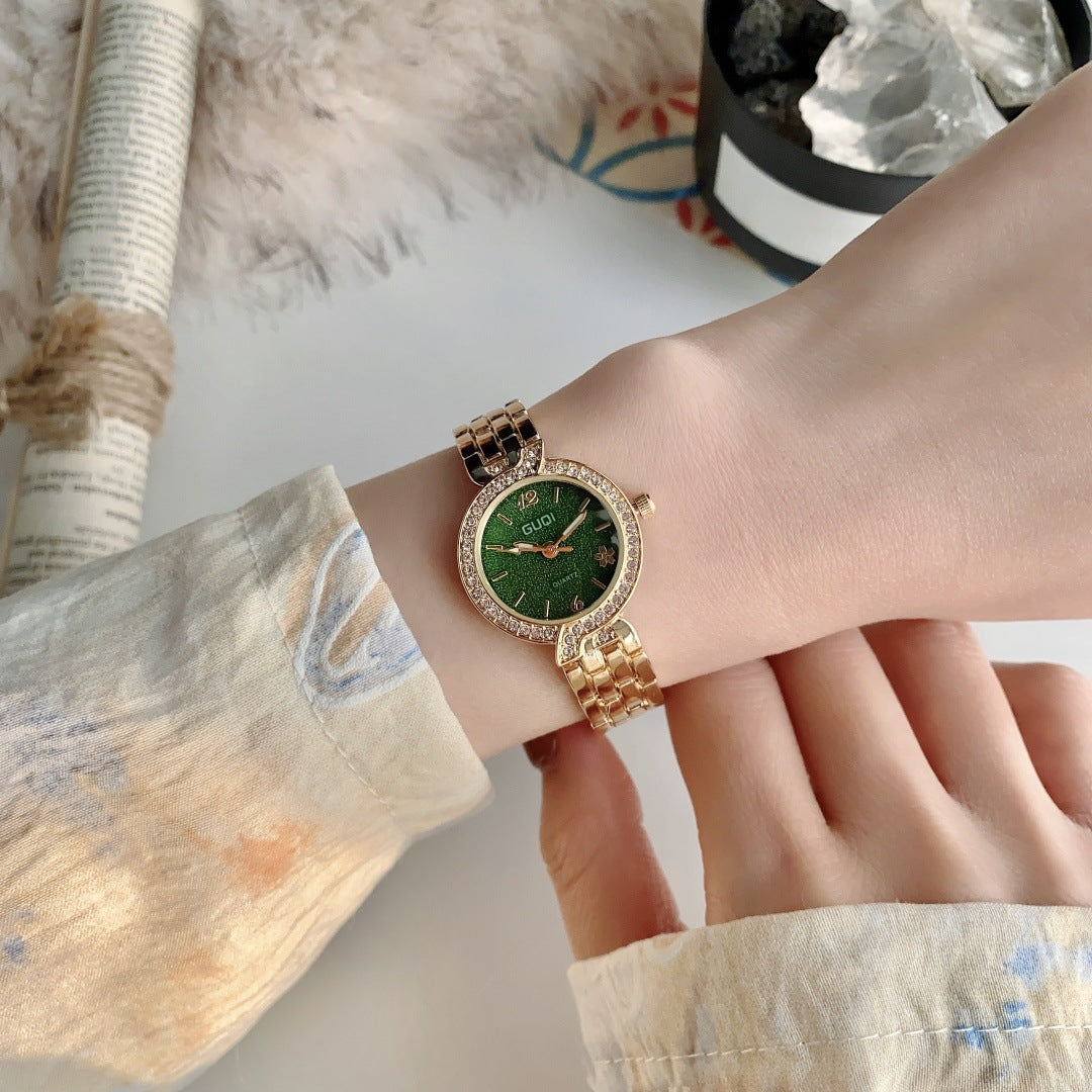 GUDI crystal-style bezel round bracelet watch in gold tone with green dial
