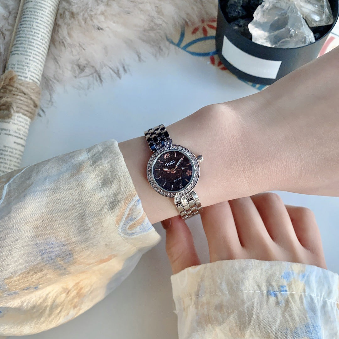 GUDI crystal-style bezel round bracelet watch in silver tone with black dial