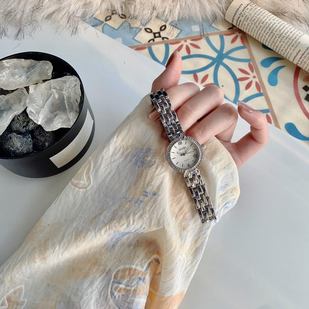 GUDI crystal-style bezel round bracelet watch in silver tone with white dial