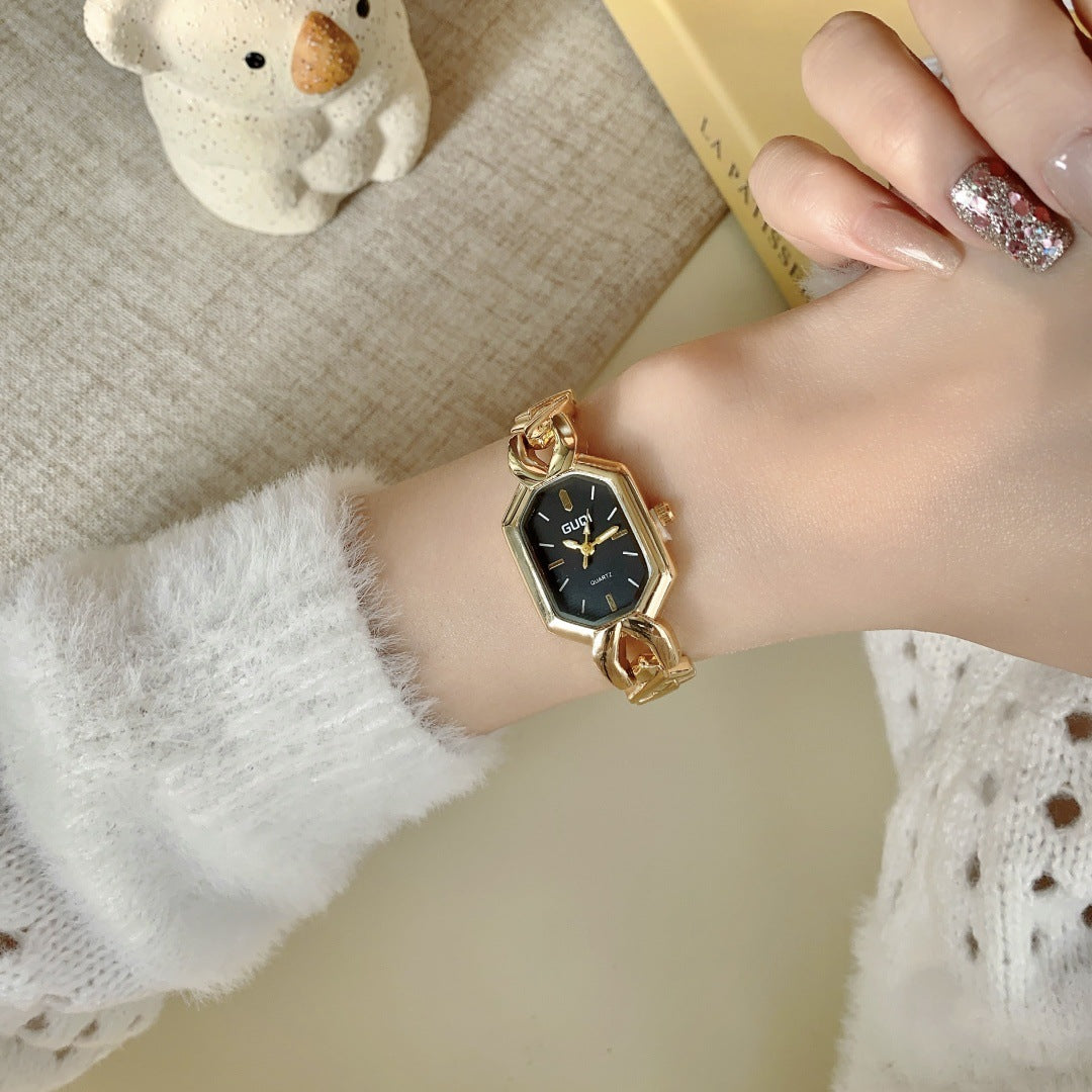 GUDI geometric bracelet watch in gold tone with black dial