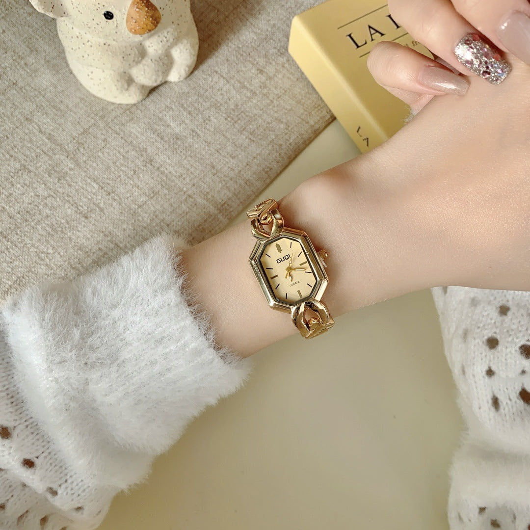 GUDI geometric bracelet watch in gold tone with champagne dial