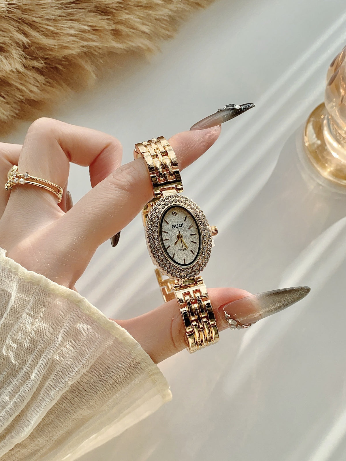 GUDI oval crystal-style jewelry watch with classic link bracelet and white dial