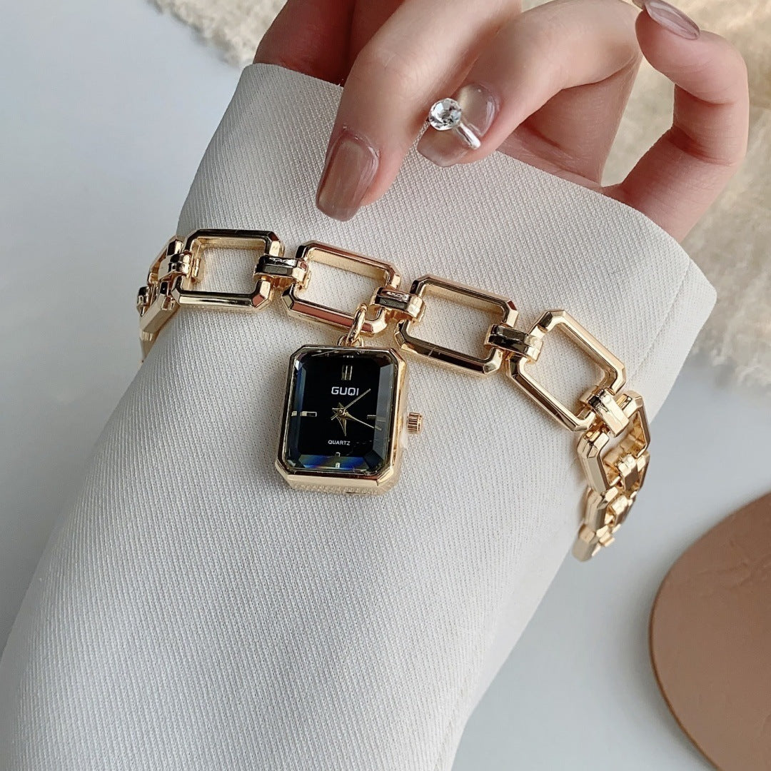 GUDI square charm bracelet quartz watch in gold tone with black dial