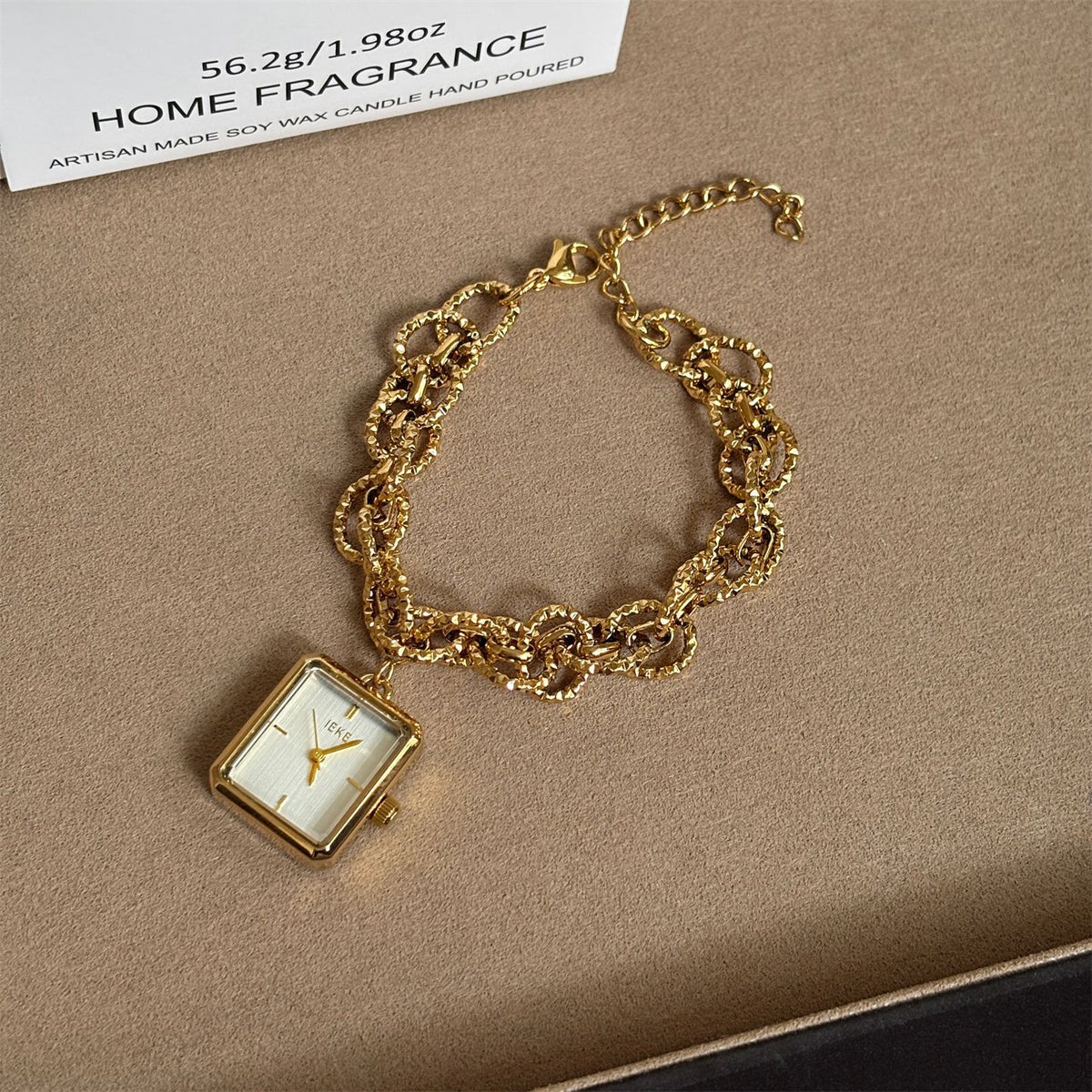 IEKE gold-tone chain bracelet watch with silver-white dial