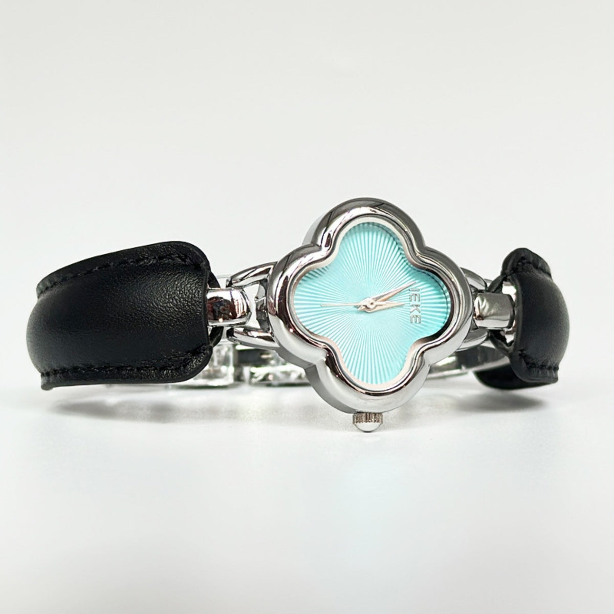 IEKE silver clover watch aqua dial black accents