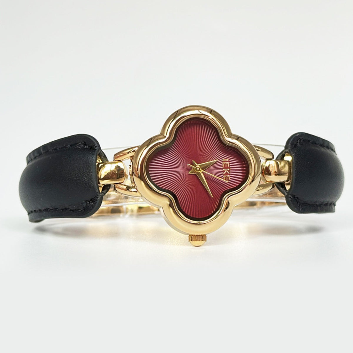 IEKE gold clover watch burgundy dial black accents