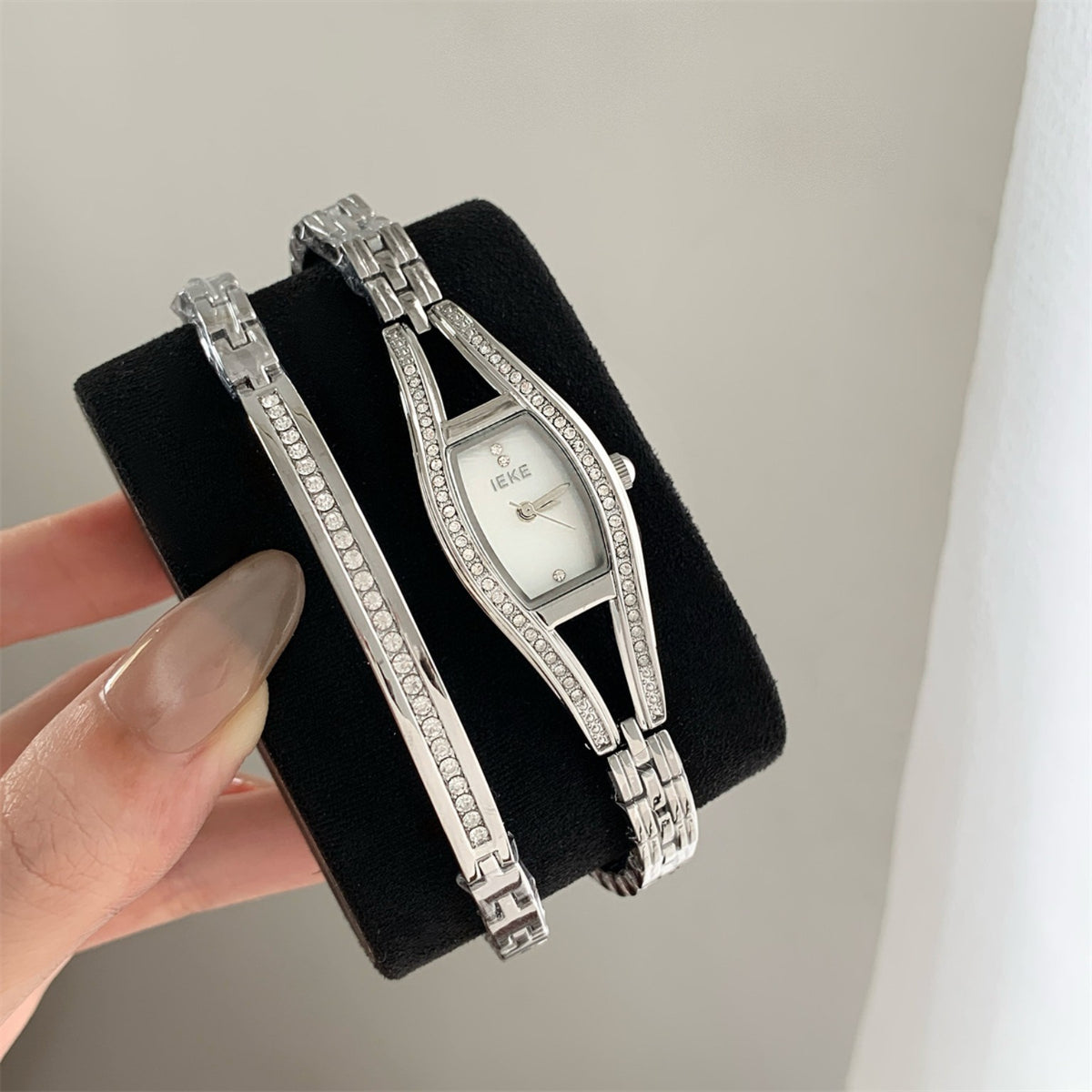 IEKE women's crystal bracelet watch in silver tone with white dial