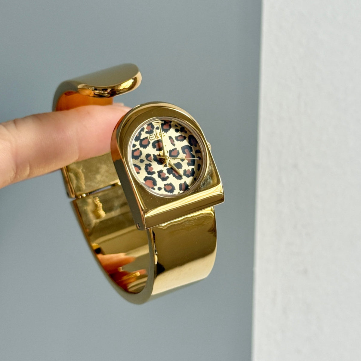 IEKE cuff bracelet watch with leopard print dial
