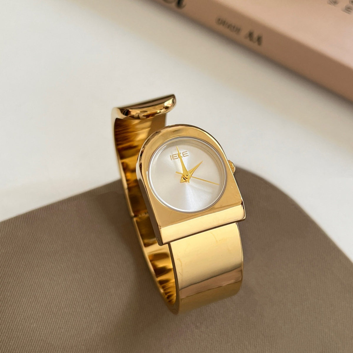 IEKE cuff bracelet watch with white dial