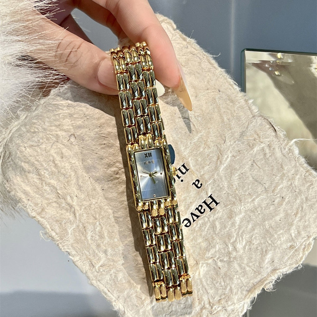IEKE gold-tone rectangular bracelet watch detail