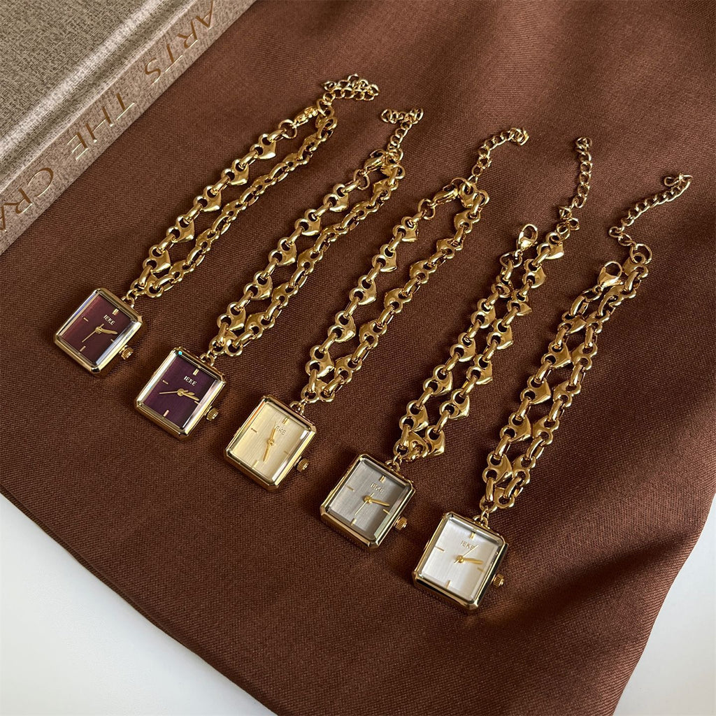 IEKE petite square heart-link bracelet watch collection with plum, champagne, grey and white dials