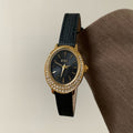 IEKE women's oval crystal watch with black strap, gold case and black dial
