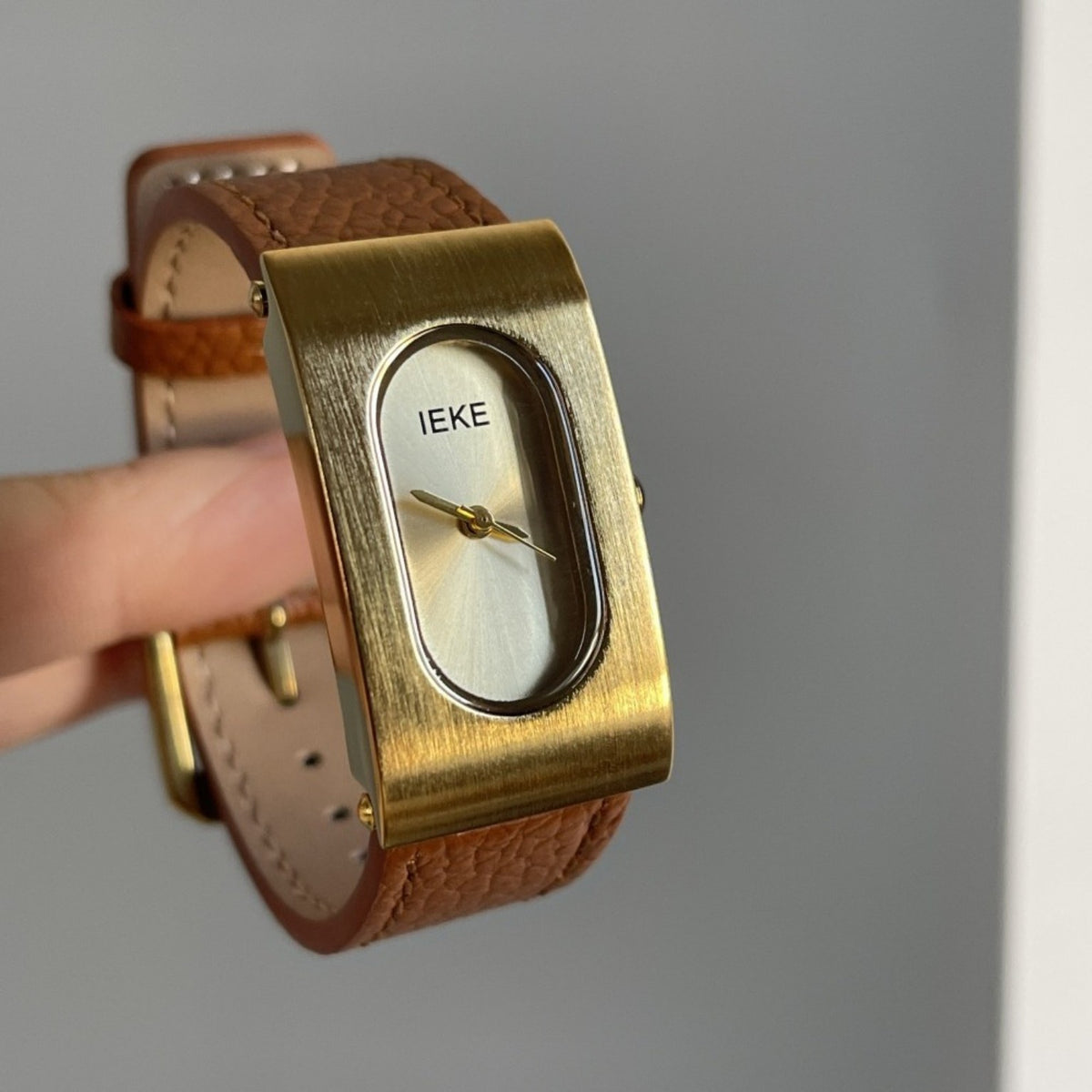 IEKE oval minimalist gold-tone women's watch with textured brown strap