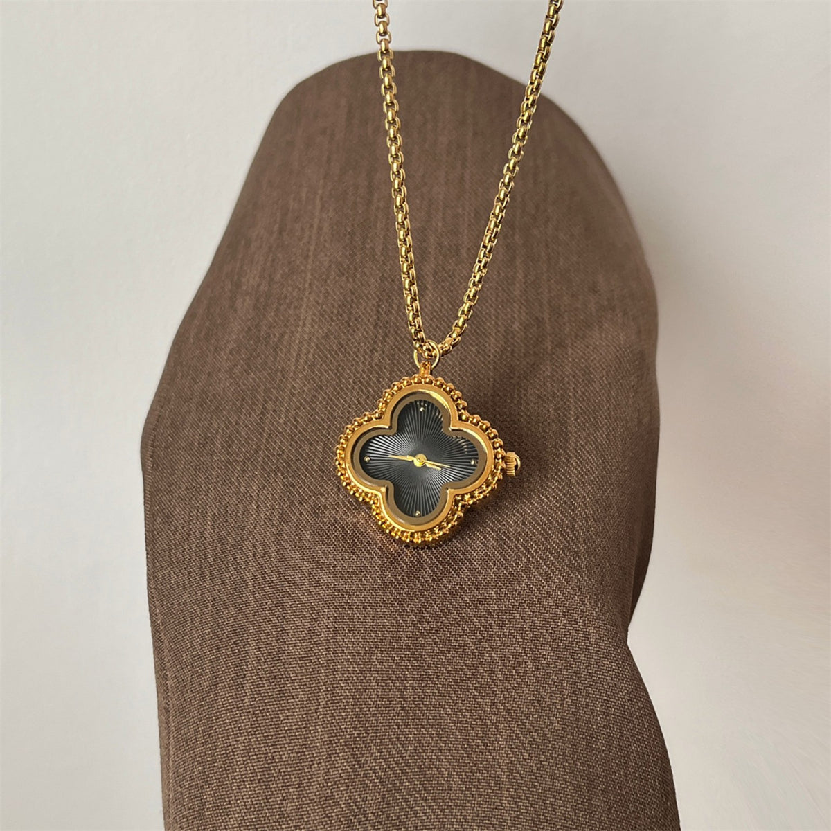 IEKE gold clover pendant necklace watch with black dial