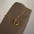 IEKE gold-tone pendant watch with burgundy dial