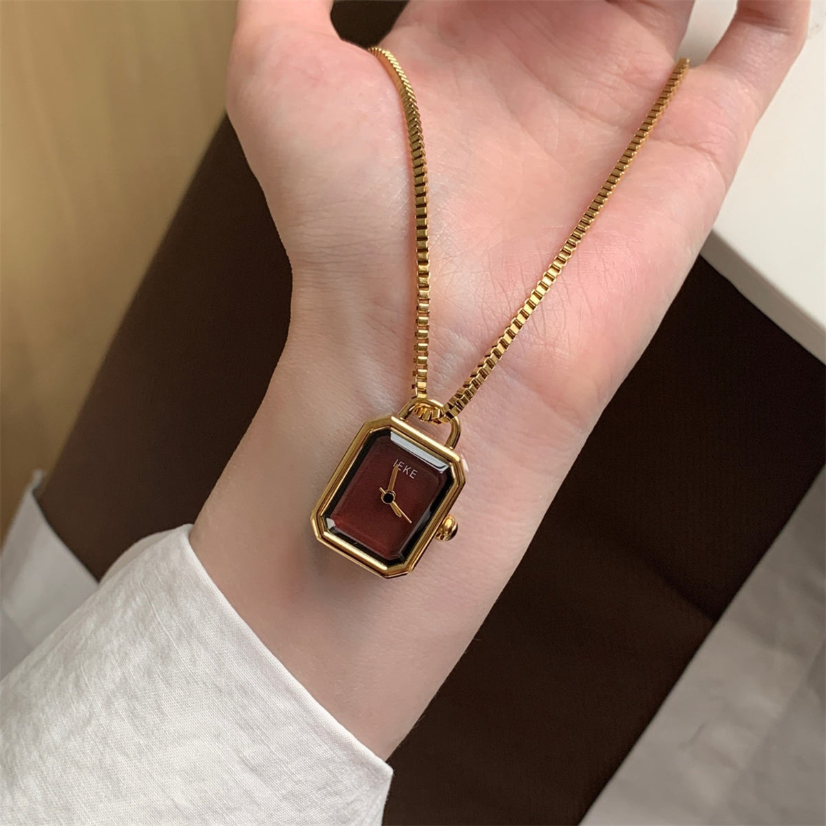 IEKE gold rectangular pendant necklace watch with burgundy dial