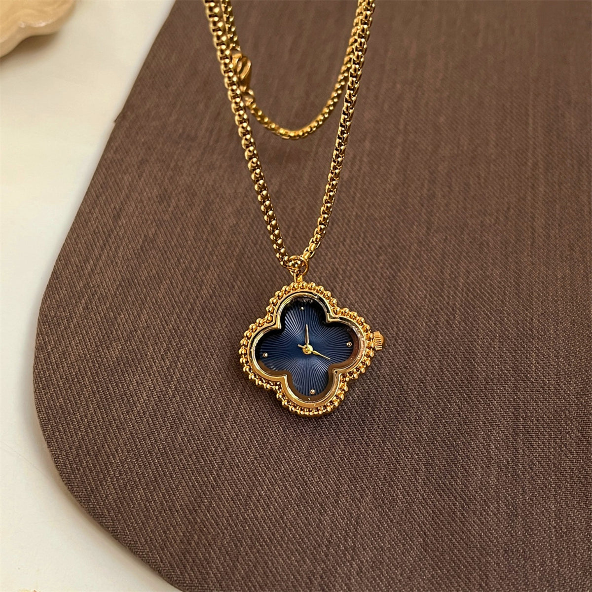 IEKE gold clover pendant necklace watch with navy dial