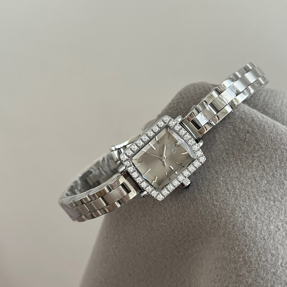 IEKE petite square crystal bezel watch with silver-tone bracelet and grey dial