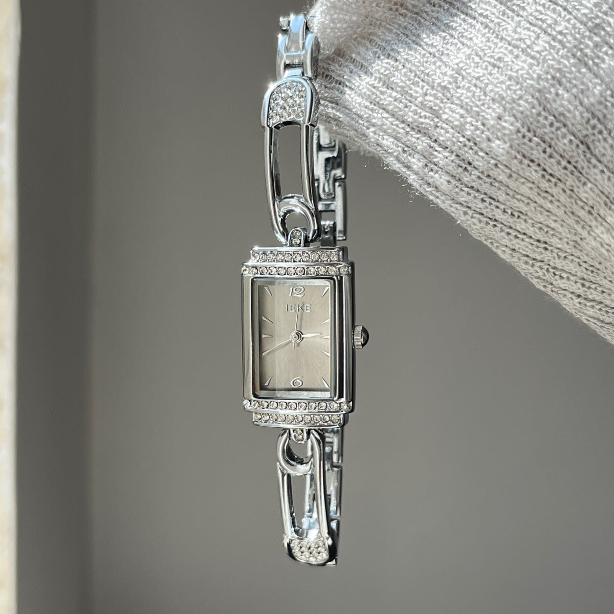 IEKE silver-tone pin-link bracelet watch with white dial