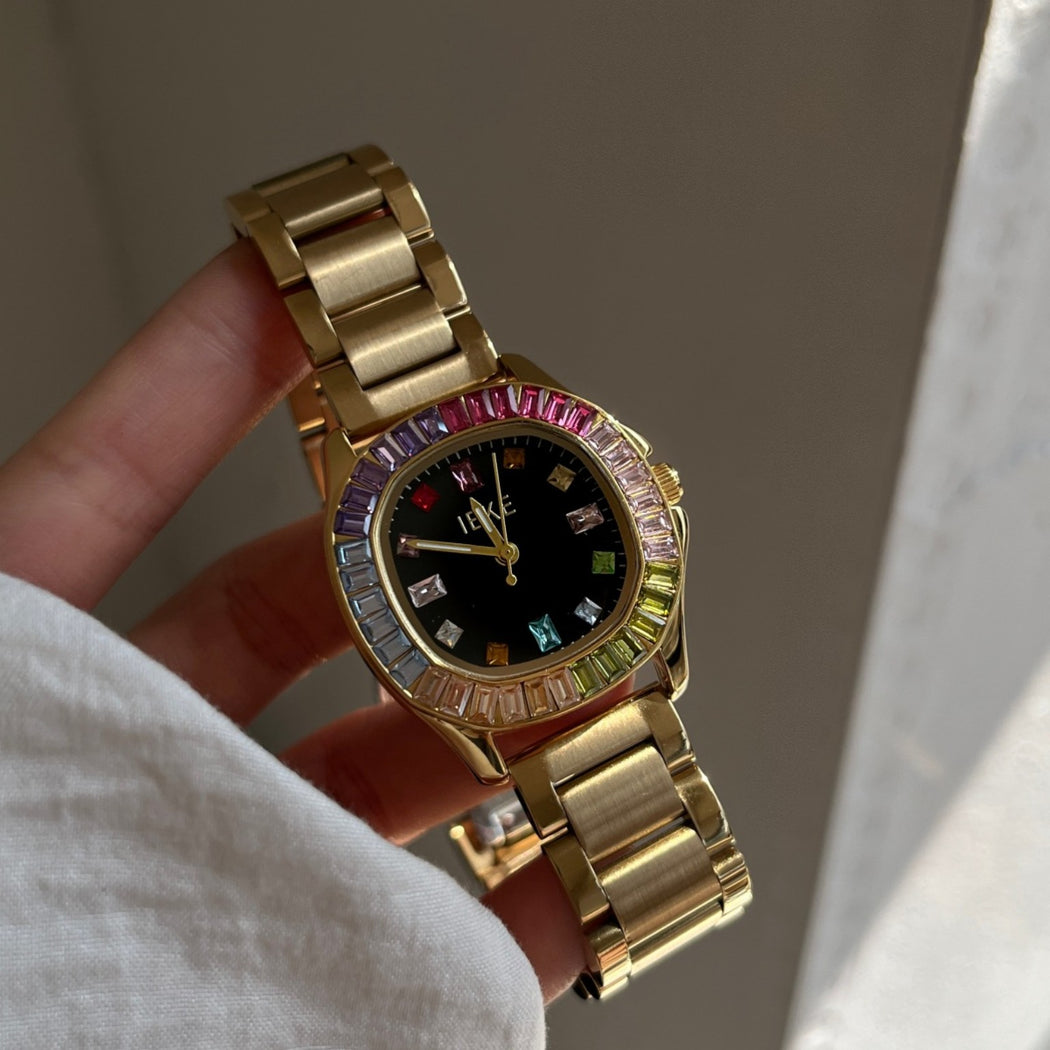 IEKE women's rainbow crystal bracelet watch with gold-tone bracelet and black dial