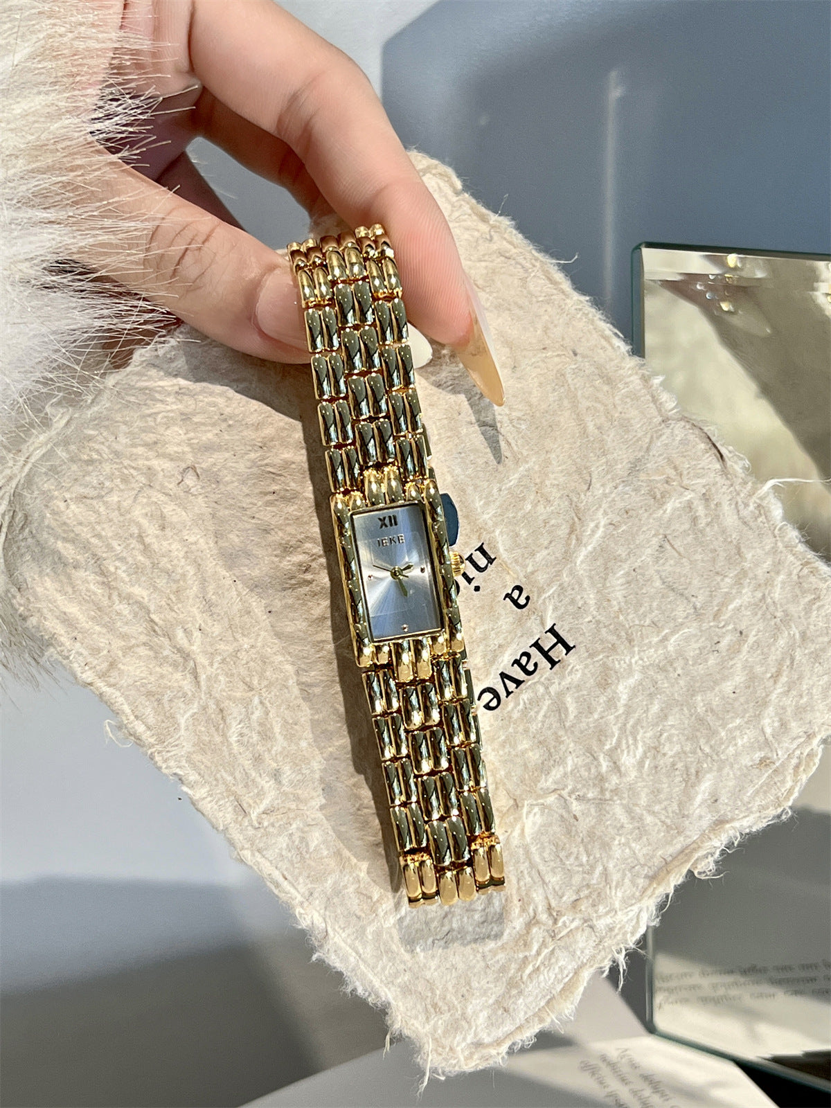 IEKE gold-tone rectangular chain bracelet watch with light dial